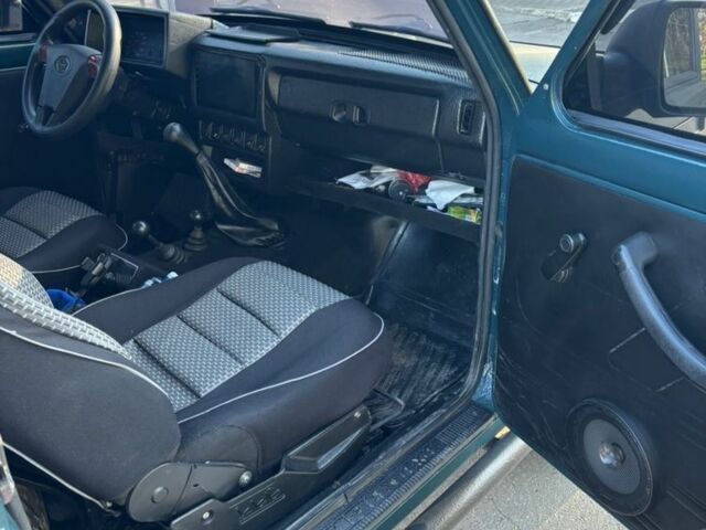 Зеленый ВАЗ 21214, объемом двигателя 1.7 л и пробегом 240 тыс. км за 4500 $, фото 6 на Automoto.ua