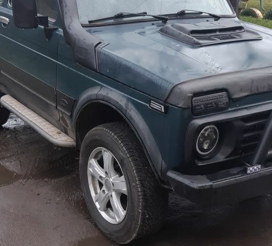 Зеленый ВАЗ 21214, объемом двигателя 1.7 л и пробегом 148 тыс. км за 2800 $, фото 2 на Automoto.ua