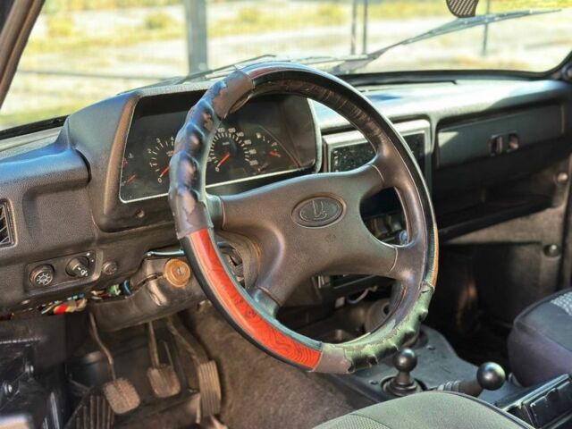 Зеленый ВАЗ 21214, объемом двигателя 1.7 л и пробегом 431 тыс. км за 4299 $, фото 7 на Automoto.ua