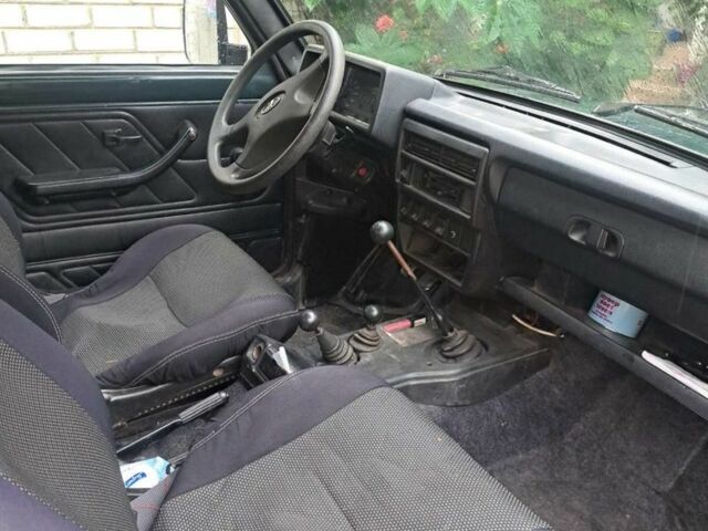 Зеленый ВАЗ 21214, объемом двигателя 1.7 л и пробегом 300 тыс. км за 2600 $, фото 4 на Automoto.ua