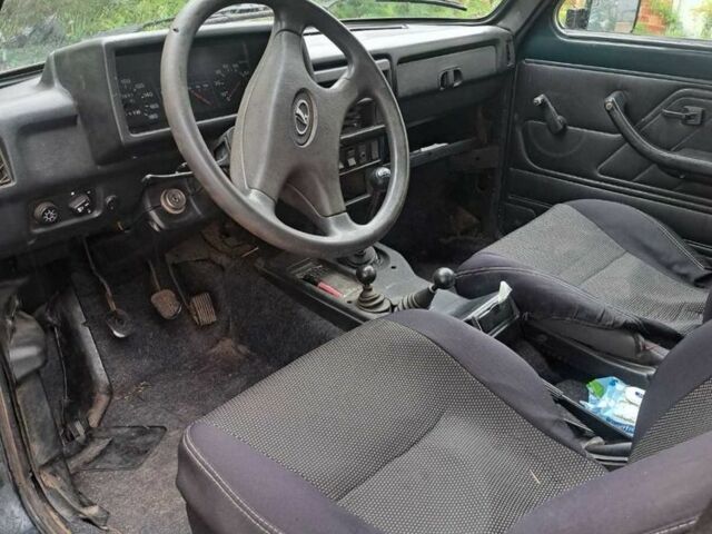 Зеленый ВАЗ 21214, объемом двигателя 1.7 л и пробегом 300 тыс. км за 2600 $, фото 6 на Automoto.ua