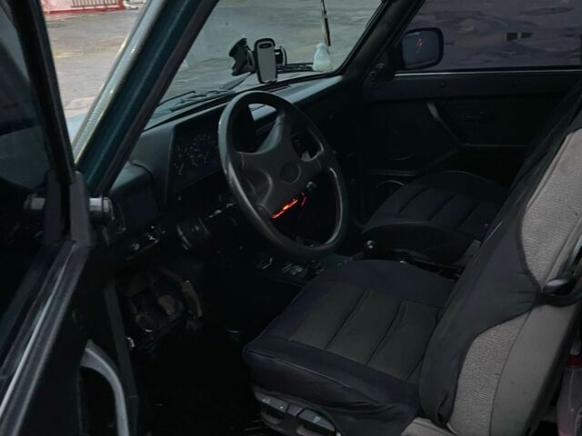 Зелений ВАЗ 21214, об'ємом двигуна 1.7 л та пробігом 130 тис. км за 5200 $, фото 6 на Automoto.ua
