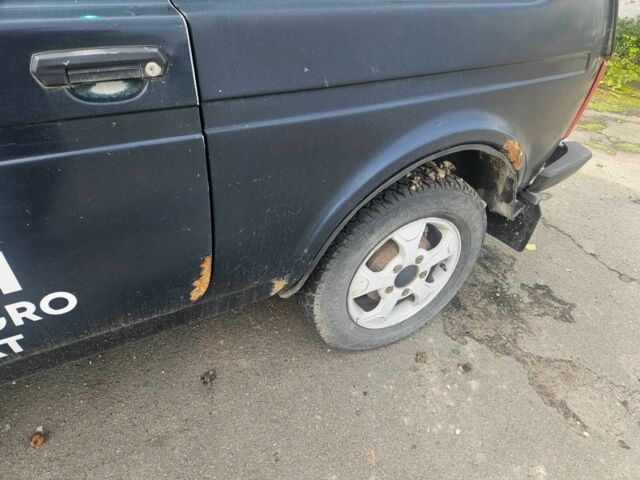 Зелений ВАЗ 21214, об'ємом двигуна 1.7 л та пробігом 300 тис. км за 1787 $, фото 7 на Automoto.ua