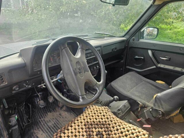 Зелений ВАЗ 21214, об'ємом двигуна 1.7 л та пробігом 300 тис. км за 1787 $, фото 9 на Automoto.ua