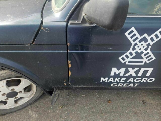 Зелений ВАЗ 21214, об'ємом двигуна 1.7 л та пробігом 300 тис. км за 1787 $, фото 6 на Automoto.ua