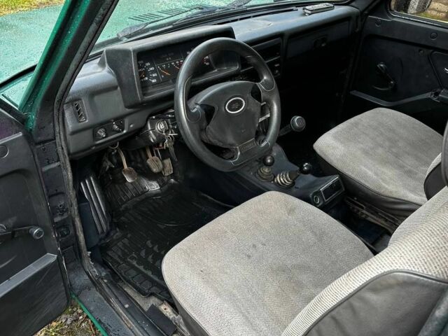 Зелений ВАЗ 21214, об'ємом двигуна 1.7 л та пробігом 150 тис. км за 1700 $, фото 4 на Automoto.ua