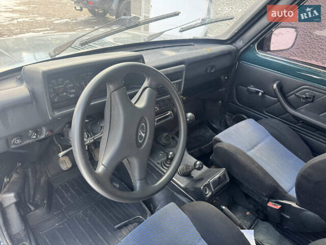 Зелений ВАЗ 21214, об'ємом двигуна 1.7 л та пробігом 90 тис. км за 4350 $, фото 11 на Automoto.ua