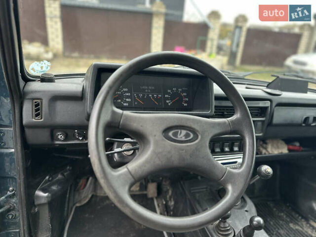 Зелений ВАЗ 21214, об'ємом двигуна 1.7 л та пробігом 105 тис. км за 4700 $, фото 7 на Automoto.ua