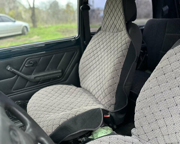 Зелений ВАЗ 21214, об'ємом двигуна 1.7 л та пробігом 105 тис. км за 4700 $, фото 8 на Automoto.ua