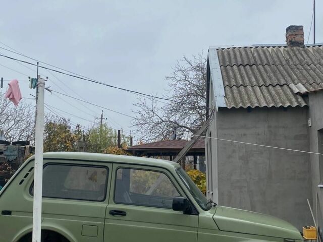 Зелений ВАЗ 21214, об'ємом двигуна 1.7 л та пробігом 300 тис. км за 2607 $, фото 4 на Automoto.ua