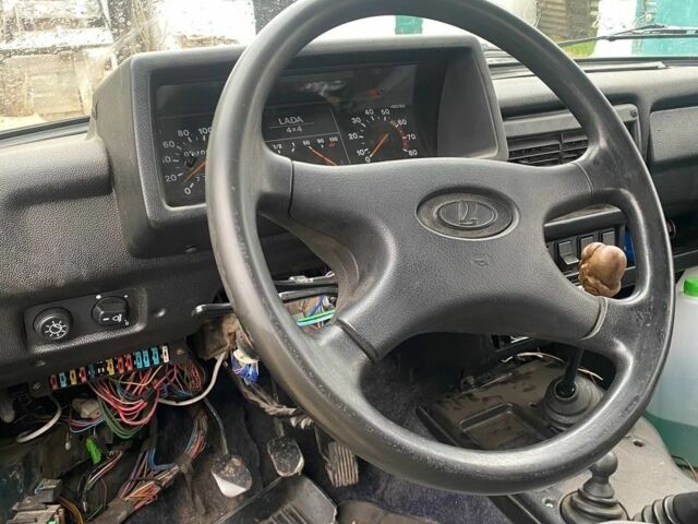 Зелений ВАЗ 21214, об'ємом двигуна 1.7 л та пробігом 300 тис. км за 2607 $, фото 7 на Automoto.ua