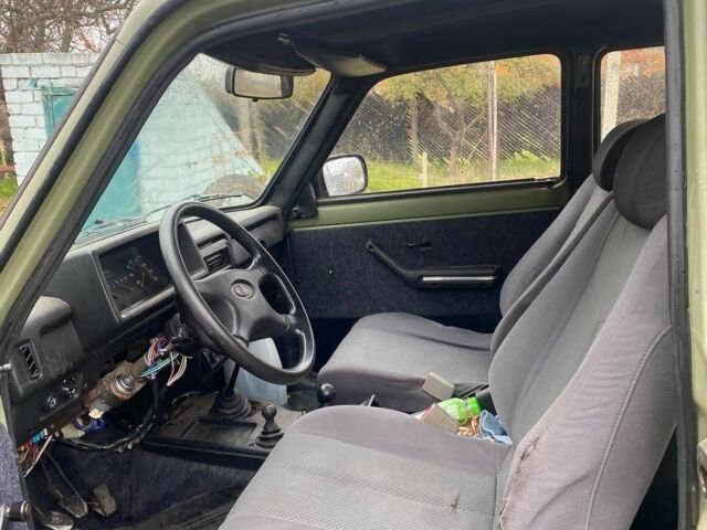 Зелений ВАЗ 21214, об'ємом двигуна 1.7 л та пробігом 300 тис. км за 2607 $, фото 5 на Automoto.ua