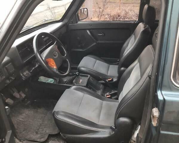 Зеленый ВАЗ 21214, объемом двигателя 1.7 л и пробегом 230 тыс. км за 3400 $, фото 5 на Automoto.ua