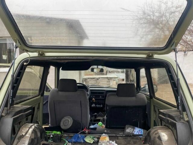 Зелений ВАЗ 21214, об'ємом двигуна 1.7 л та пробігом 300 тис. км за 2607 $, фото 6 на Automoto.ua