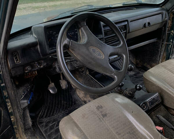 Зелений ВАЗ 21214, об'ємом двигуна 1.7 л та пробігом 300 тис. км за 1777 $, фото 5 на Automoto.ua