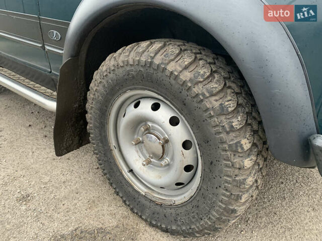 Зеленый ВАЗ 21214, объемом двигателя 1.7 л и пробегом 175 тыс. км за 3300 $, фото 2 на Automoto.ua