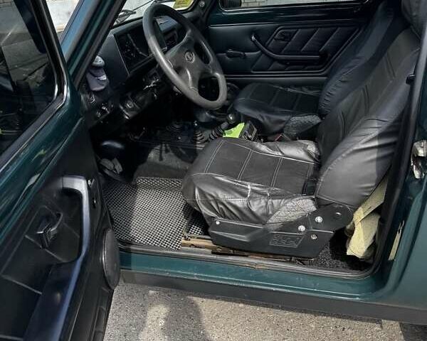Зелений ВАЗ 21214, об'ємом двигуна 1.7 л та пробігом 142 тис. км за 4000 $, фото 5 на Automoto.ua