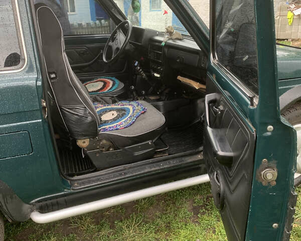 Зеленый ВАЗ 21214, объемом двигателя 1.7 л и пробегом 178 тыс. км за 3800 $, фото 4 на Automoto.ua