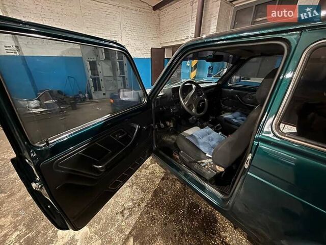 Зеленый ВАЗ 21214, объемом двигателя 1.7 л и пробегом 270 тыс. км за 4300 $, фото 4 на Automoto.ua