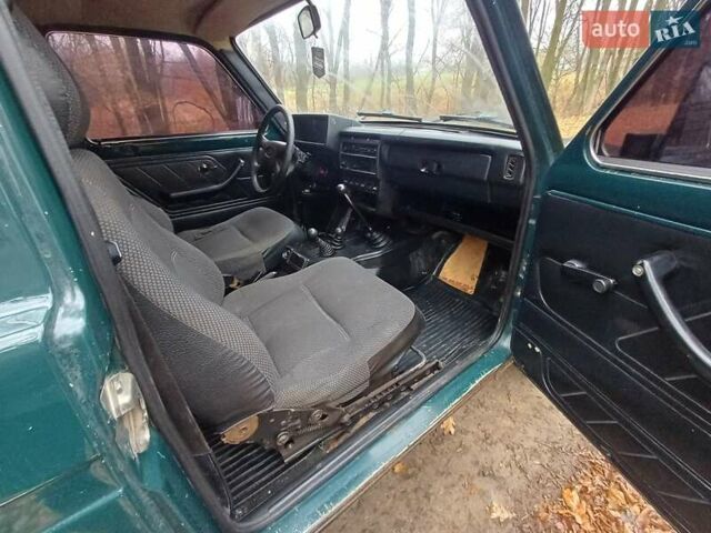 Зеленый ВАЗ 21214, объемом двигателя 1.69 л и пробегом 200 тыс. км за 2850 $, фото 10 на Automoto.ua