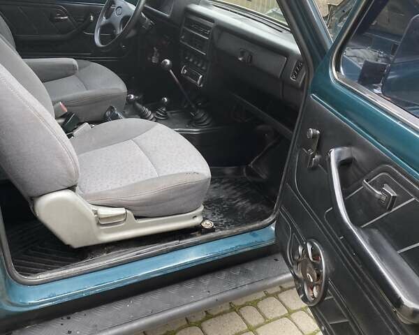 Зелений ВАЗ 21214, об'ємом двигуна 1.7 л та пробігом 127 тис. км за 3850 $, фото 10 на Automoto.ua