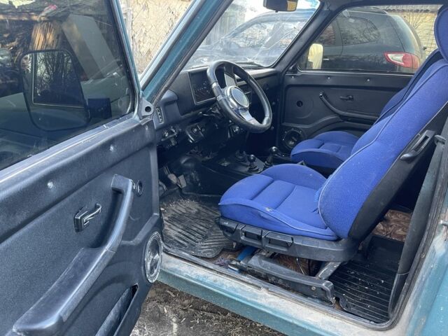 Зеленый ВАЗ 21214, объемом двигателя 1.7 л и пробегом 235 тыс. км за 2600 $, фото 1 на Automoto.ua