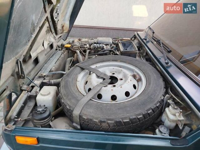 Зеленый ВАЗ 21214, объемом двигателя 1.7 л и пробегом 170 тыс. км за 2999 $, фото 15 на Automoto.ua