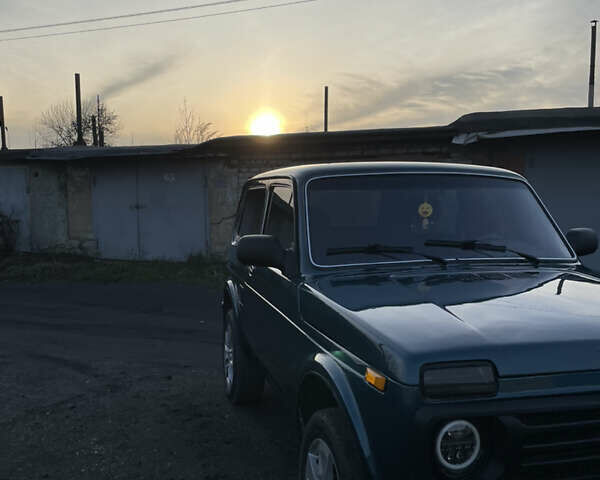 Зелений ВАЗ 21214, об'ємом двигуна 1.7 л та пробігом 231 тис. км за 4050 $, фото 9 на Automoto.ua