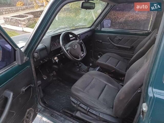 Зелений ВАЗ 21214, об'ємом двигуна 1.69 л та пробігом 186 тис. км за 3000 $, фото 4 на Automoto.ua