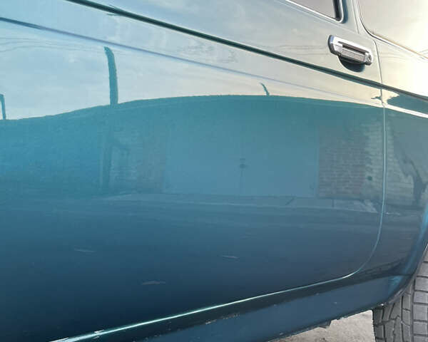 Зелений ВАЗ 21214, об'ємом двигуна 1.7 л та пробігом 231 тис. км за 4050 $, фото 3 на Automoto.ua