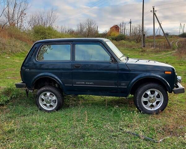 Зеленый ВАЗ 21214, объемом двигателя 1.69 л и пробегом 169 тыс. км за 3000 $, фото 6 на Automoto.ua