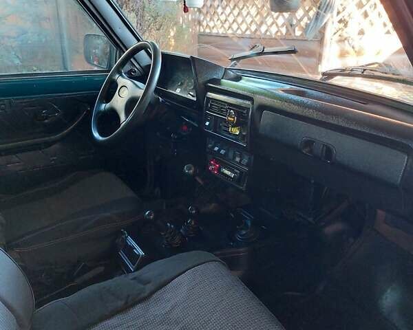 Зеленый ВАЗ 21214, объемом двигателя 1.69 л и пробегом 169 тыс. км за 3000 $, фото 20 на Automoto.ua