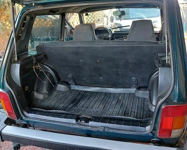 Зеленый ВАЗ 21214, объемом двигателя 1.69 л и пробегом 169 тыс. км за 3000 $, фото 19 на Automoto.ua