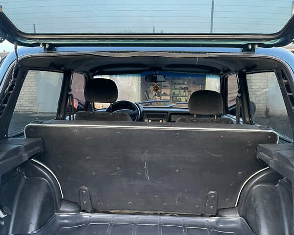 Зелений ВАЗ 21214, об'ємом двигуна 1.7 л та пробігом 231 тис. км за 4050 $, фото 12 на Automoto.ua