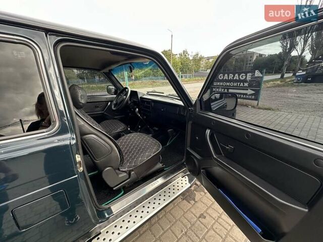Зеленый ВАЗ 21214, объемом двигателя 1.69 л и пробегом 111 тыс. км за 7000 $, фото 14 на Automoto.ua