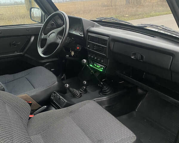 Зелений ВАЗ 21214, об'ємом двигуна 1.7 л та пробігом 130 тис. км за 3800 $, фото 11 на Automoto.ua