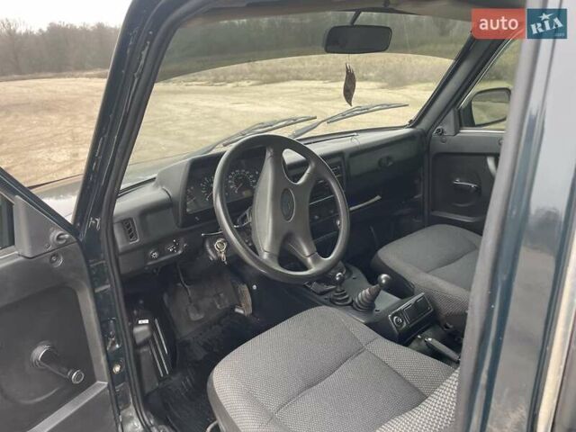 Зеленый ВАЗ 21214, объемом двигателя 1.69 л и пробегом 81 тыс. км за 6100 $, фото 4 на Automoto.ua
