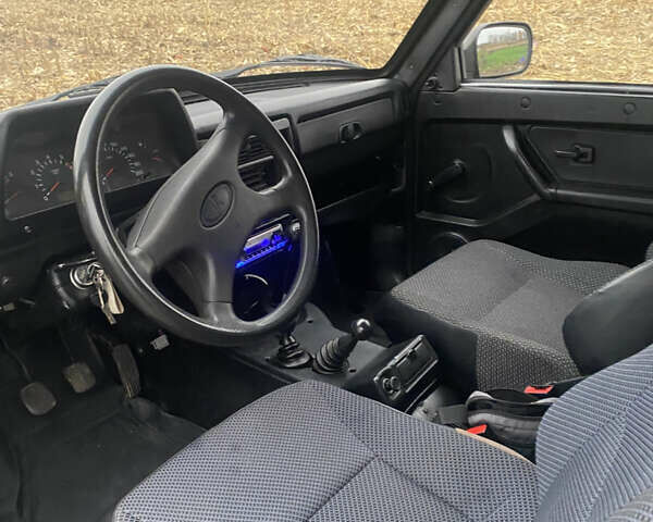 Зелений ВАЗ 21214, об'ємом двигуна 1.7 л та пробігом 130 тис. км за 3800 $, фото 9 на Automoto.ua