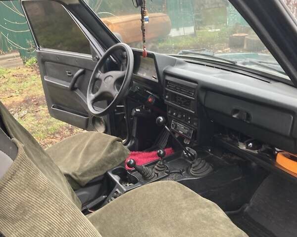 Зеленый ВАЗ 21214, объемом двигателя 1.7 л и пробегом 369 тыс. км за 3500 $, фото 4 на Automoto.ua