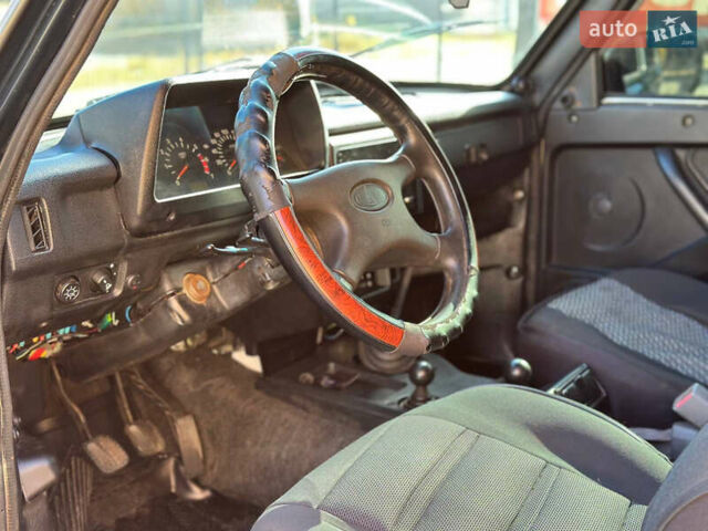 Зеленый ВАЗ 21214, объемом двигателя 1.69 л и пробегом 431 тыс. км за 4299 $, фото 9 на Automoto.ua