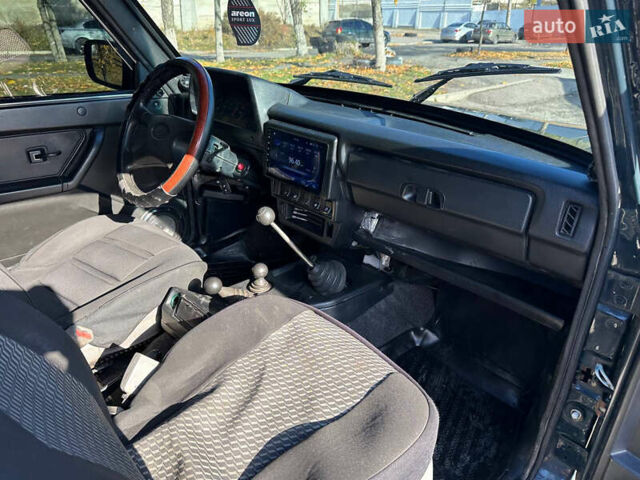 Зеленый ВАЗ 21214, объемом двигателя 1.69 л и пробегом 431 тыс. км за 4299 $, фото 12 на Automoto.ua