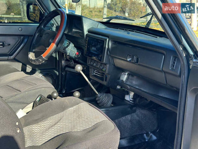 Зеленый ВАЗ 21214, объемом двигателя 1.69 л и пробегом 431 тыс. км за 4299 $, фото 10 на Automoto.ua