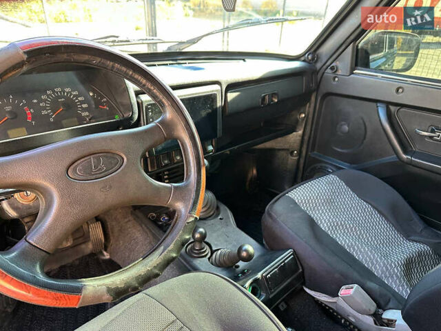 Зеленый ВАЗ 21214, объемом двигателя 1.69 л и пробегом 431 тыс. км за 4299 $, фото 6 на Automoto.ua
