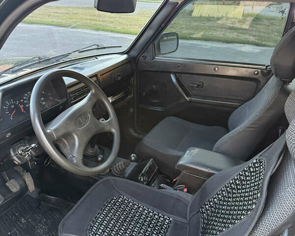 Зелений ВАЗ 21214, об'ємом двигуна 1.7 л та пробігом 84 тис. км за 6200 $, фото 5 на Automoto.ua