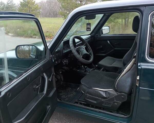 Зеленый ВАЗ 21214, объемом двигателя 1.7 л и пробегом 322 тыс. км за 3800 $, фото 5 на Automoto.ua