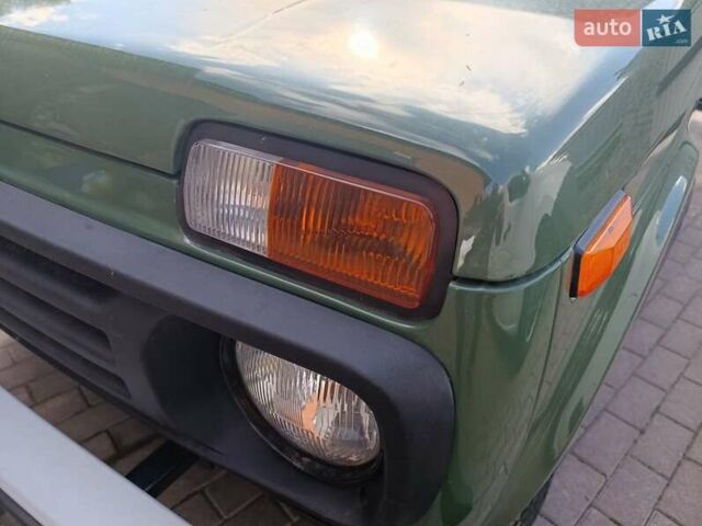 Зелений ВАЗ 21214, об'ємом двигуна 1.7 л та пробігом 32 тис. км за 7900 $, фото 34 на Automoto.ua