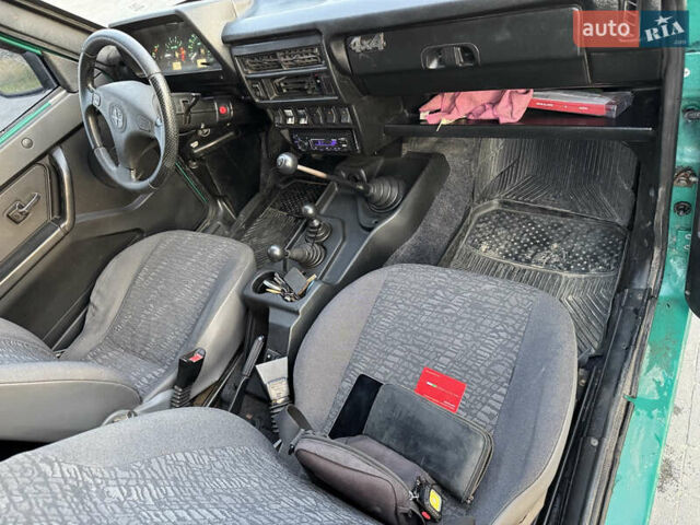 Зеленый ВАЗ 21214, объемом двигателя 1.7 л и пробегом 137 тыс. км за 4000 $, фото 10 на Automoto.ua