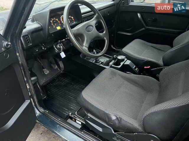 Зелений ВАЗ 21214, об'ємом двигуна 1.7 л та пробігом 162 тис. км за 5100 $, фото 11 на Automoto.ua