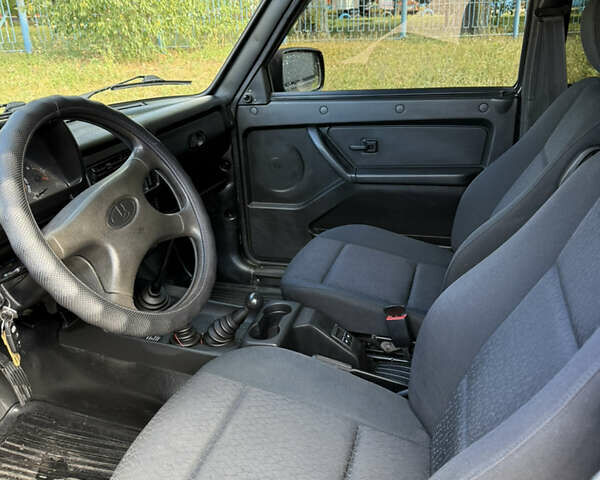 Зелений ВАЗ 21214, об'ємом двигуна 1.69 л та пробігом 68 тис. км за 6299 $, фото 4 на Automoto.ua