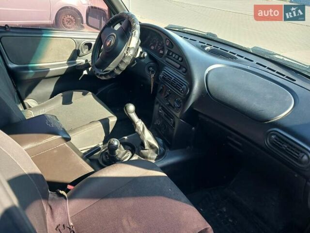 Чорний ВАЗ 2123 Niva, об'ємом двигуна 1.69 л та пробігом 338 тис. км за 3100 $, фото 7 на Automoto.ua